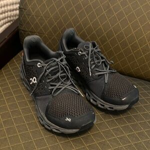 On Running Black Athletic Shoes. Used condition see all photos is and videos.